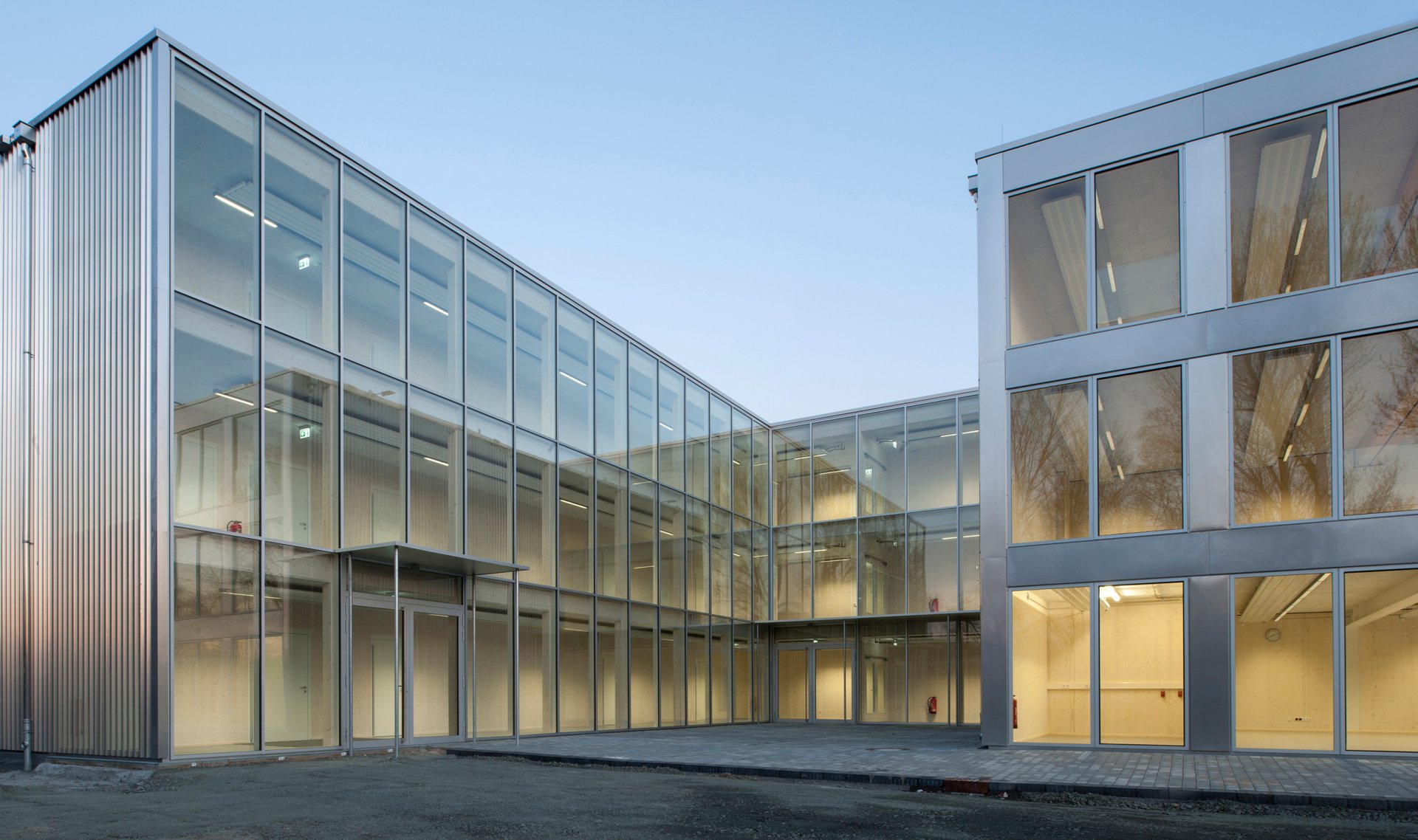 Prefabricated pre-finished volumetric construction (PPVC) involving the assembly of timber modules to create a three-story school building © Thomas Mayer